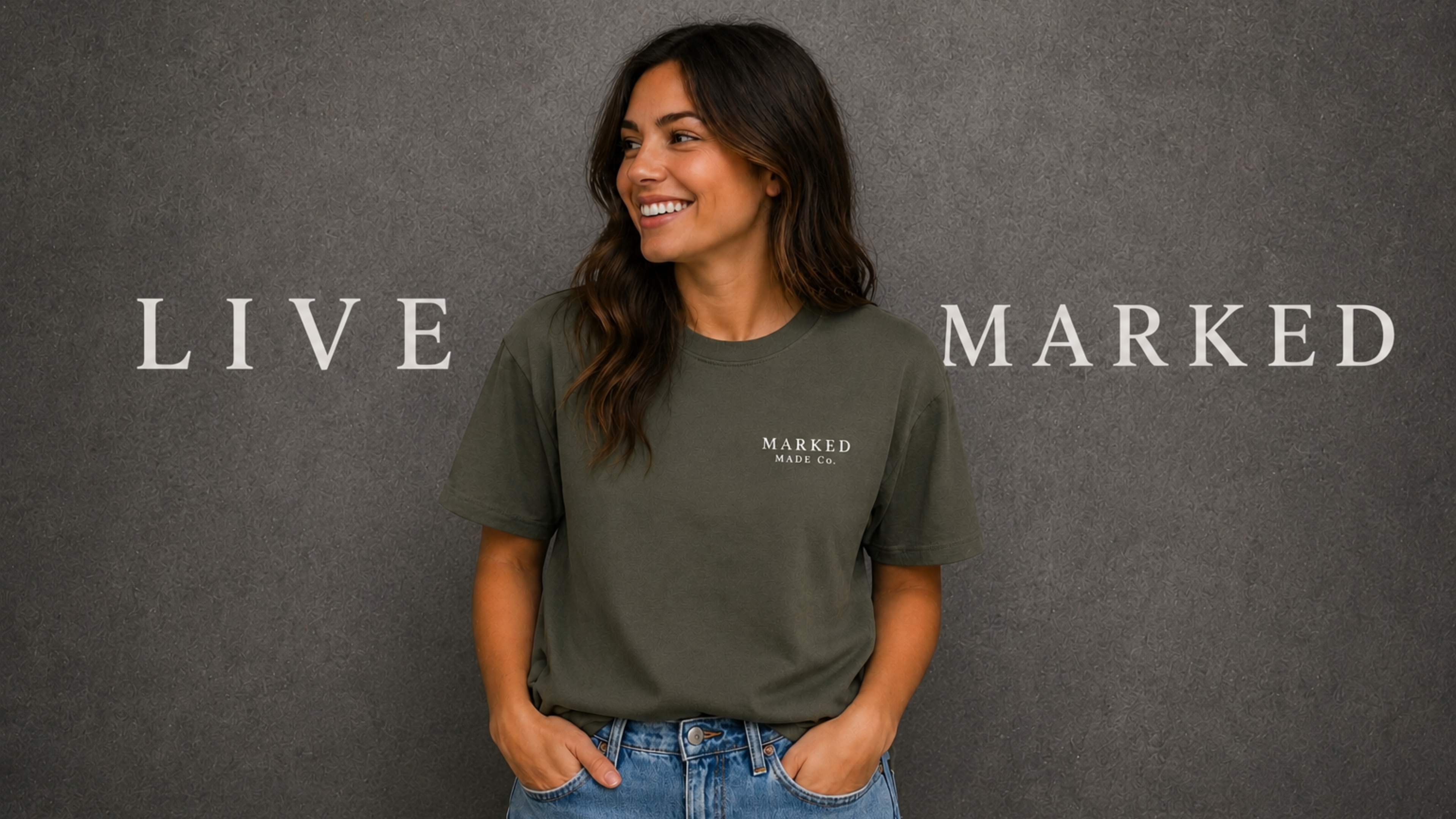 Woman wearing a green t-shirt with 'Marked' logo against a dark background